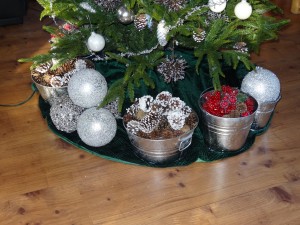 Galvanized pails and pine cones